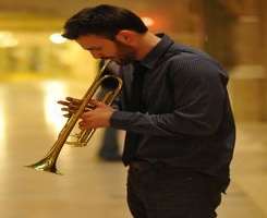 He learned to play trumpet for his role in the movie 